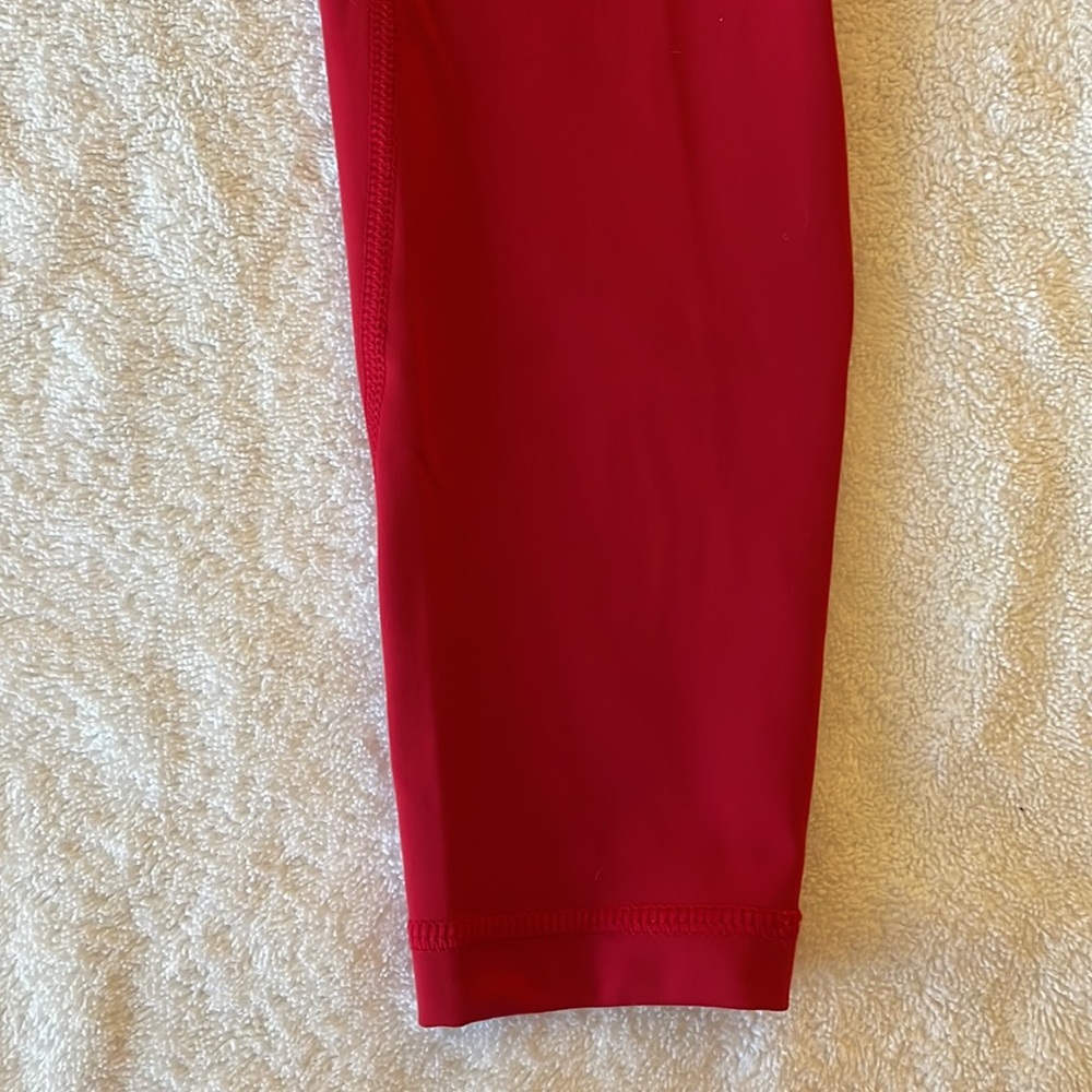 Red workout leggings with back and side pockets